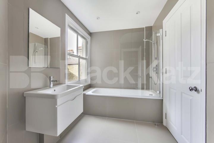 Triplex & offering 1160 Sq. Ft. of living & entertaining space Kendoa Road, Clapham